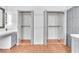 Bathroom with a gray vanity, mirror, tile countertop, and three closets at 3158 La Luna Cir, Henderson, NV 89014