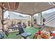 Outdoor workout area setup in backyard includes weightlifting equipment and turf at 3158 La Luna Cir, Henderson, NV 89014