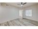 Bright bedroom with a ceiling fan and two windows providing natural light at 3400 Cabana Dr # 1048, Las Vegas, NV 89122
