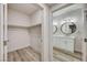Walk-in closet leading to bathroom with double sink and vanity at 3400 Cabana Dr # 1048, Las Vegas, NV 89122