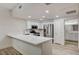 Kitchen features stainless appliances, solid countertops, and bright recessed lighting at 3400 Cabana Dr # 1048, Las Vegas, NV 89122
