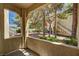 Covered patio offers views of the landscaped grounds and building exteriors at 3400 Cabana Dr # 1048, Las Vegas, NV 89122