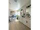 Bright bathroom featuring a soaking tub, dual vanity, and modern fixtures at 3791 Soplo Rd, Pahrump, NV 89048