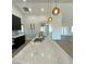 Modern kitchen features a large island with marble countertops and pendant lighting at 3791 Soplo Rd, Pahrump, NV 89048