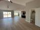 Open floor plan with wood floors, dining area, and living room with scenic views at 3791 Soplo Rd, Pahrump, NV 89048