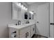 Bathroom featuring a double sink vanity with modern fixtures and a spacious countertop at 394 Lombardy Cir, Henderson, NV 89015