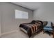 Cozy bedroom with a comfortable bed, soft carpet, and bright natural light at 394 Lombardy Cir, Henderson, NV 89015
