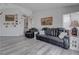 Spacious living room with comfortable seating, neutral tones, and stylish decor at 394 Lombardy Cir, Henderson, NV 89015