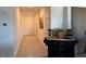 Inviting hallway with tile floors and ample space to add decor at 411 Hellebores Ave, North Las Vegas, NV 89084