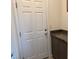 Convenient mud room featuring a door to the outside and a granite countertop at 411 Hellebores Ave, North Las Vegas, NV 89084
