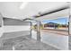 Spacious garage with epoxy flooring and automatic door openers provides secure parking and extra storage at 4510 Rubious Ave, North Las Vegas, NV 89084
