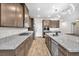 Elegant kitchen with granite countertops, stainless steel appliances, and ample cabinet space for storage at 4510 Rubious Ave, North Las Vegas, NV 89084