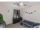 bedroom featuring playful decor, a dinosaur theme, and warm neutral tones at 4622 English Lavender Ave, North Las Vegas, NV 89031