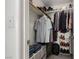 Walk-in closet with functional storage space and organization for clothes and accessories at 4622 English Lavender Ave, North Las Vegas, NV 89031