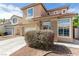 Well-maintained two-story home features manicured landscaping and a clean, welcoming facade at 4622 English Lavender Ave, North Las Vegas, NV 89031