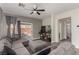 Cozy living room with a sectional sofa, leading to the outdoor patio at 4622 English Lavender Ave, North Las Vegas, NV 89031