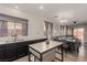 Bright living room features an open floor plan and modern decor throughout the space at 4622 English Lavender Ave, North Las Vegas, NV 89031