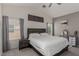 Large main bedroom features dual windows for natural light and a neutral color palette at 4622 English Lavender Ave, North Las Vegas, NV 89031