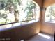 Outdoor balcony area with mature trees at 5220 Mission Carmel Ln # 207, Las Vegas, NV 89107