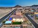 Aerial view showcases the home, landscaping and the neighborhood surroundings at 5328 Hickory Tree St, Las Vegas, NV 89149