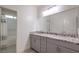Bathroom with double sinks and modern granite countertop at 5328 Hickory Tree St, Las Vegas, NV 89149