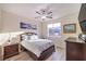 Comfortable bedroom with a warm color scheme and natural light at 5328 Hickory Tree St, Las Vegas, NV 89149