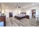 Bright Primary bedroom with hardwood floors, a king bed and ample closet space at 5328 Hickory Tree St, Las Vegas, NV 89149