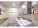 Functional laundry room with ample storage and modern appliances at 5328 Hickory Tree St, Las Vegas, NV 89149