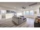 Bright living area with stylish floors, large windows and ample space for relaxation and entertainment at 5328 Hickory Tree St, Las Vegas, NV 89149