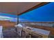 Outdoor stainless steel kitchen with built-in grill and sink with beautiful views at 5328 Hickory Tree St, Las Vegas, NV 89149