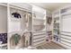 Well-organized walk-in closet with custom shelving and drawers at 5328 Hickory Tree St, Las Vegas, NV 89149
