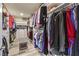 Spacious walk-in closet with custom shelving and hanging storage at 5328 Hickory Tree St, Las Vegas, NV 89149