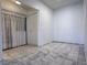 Living room with tiled floor, neutral paint and natural light at 5600 Grossmont Ave, Las Vegas, NV 89110