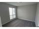 Bright bedroom with new carpet and large window, freshly painted at 5720 Goldmount Ave, Las Vegas, NV 89107