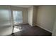 Bedroom with carpet and ample natural light, plus closet at 5720 Goldmount Ave, Las Vegas, NV 89107