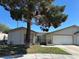 Charming single-story home with desert landscaping and a two-car garage, set under a clear blue sky at 5720 Goldmount Ave, Las Vegas, NV 89107