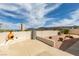 Landscaped backyard featuring a patio, cactus garden, and stucco privacy walls with mountain views at 6 Sandwedge Dr, Henderson, NV 89074