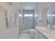Modern bathroom featuring a glass-enclosed shower and stylish fixtures at 6 Sandwedge Dr, Henderson, NV 89074