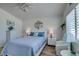 Bright bedroom features a plush bed, white furniture, and plenty of natural light from the window at 6 Sandwedge Dr, Henderson, NV 89074