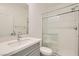 Bathroom showcasing a modern vanity and sleek glass-enclosed shower at 6830 Fallen Rock St, North Las Vegas, NV 89084