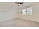 Inviting bedroom with shelving and light-filled windows offering views at 6830 Fallen Rock St, North Las Vegas, NV 89084