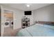 Bedroom view with laundry closet area, offering convenience and maximizing space at 687 Porchtown Ave, Las Vegas, NV 89183
