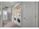 Laundry area on the upper level equipped with washer and dryer at 687 Porchtown Ave, Las Vegas, NV 89183