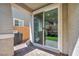 Outdoor patio featuring pavers, artificial turf, and a sliding glass door at 688 Monroe Hill Pl, Henderson, NV 89011