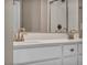 Bathroom featuring dual sinks, modern fixtures, and walk-in shower at 688 Monroe Hill Pl, Henderson, NV 89011