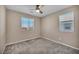 Bedroom featuring carpet, neutral walls, and windows at 688 Monroe Hill Pl, Henderson, NV 89011