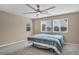 Bright bedroom with large windows and ceiling fan at 688 Monroe Hill Pl, Henderson, NV 89011