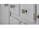 Close-up of modern white cabinetry with sleek hardware at 688 Monroe Hill Pl, Henderson, NV 89011
