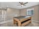 Upstairs game room with ping pong table and space for entertainment at 688 Monroe Hill Pl, Henderson, NV 89011