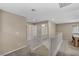 Bright loft with carpet, neutral paint, and white railing leading to downstairs at 688 Monroe Hill Pl, Henderson, NV 89011